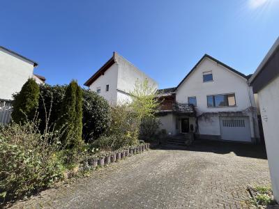.Großzügiges Einfamilienhaus mit Terrasse, Balkon und Garage in guter Lage zu City + THM, Marburger Str. 30, Gießen.