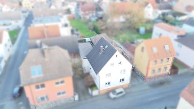 Kapitalanlage: Charmantes Einfamilienhaus mit ausgebautem Nebengebäude in sehr guter Lage von Linden-Leihgestern