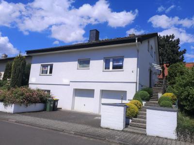 Mit wunderschönem Garten: Sehr großzügiges und gepflegtes Einfamilienhaus in Lollar-Ruttershausen